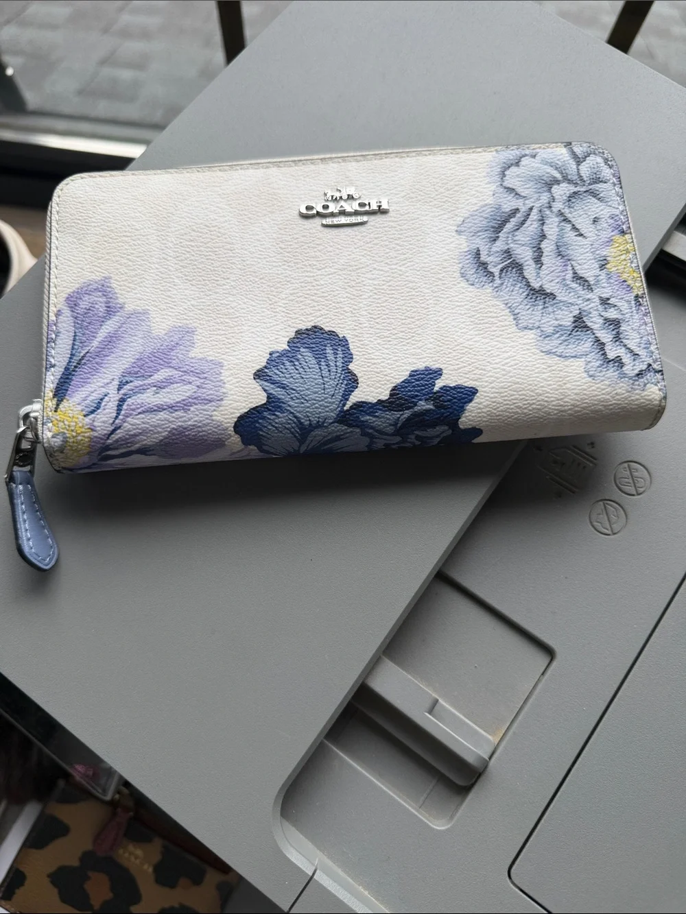 Coach long zip-around wallet in white signature canvas floral